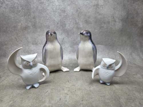 Two pairs of ceramic bird figures
