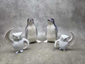 Two pairs of ceramic bird figures