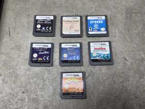 Nintendo DS Lite together with games - 2
