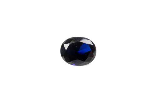 An oval synthetic blue sapphire