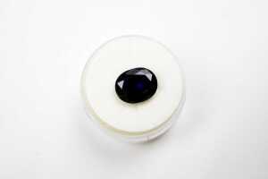 An oval synthetic blue sapphire - 4