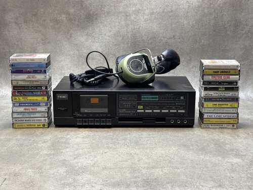 Group of cassette tapes, together with Teac cassette deck and IE headphones