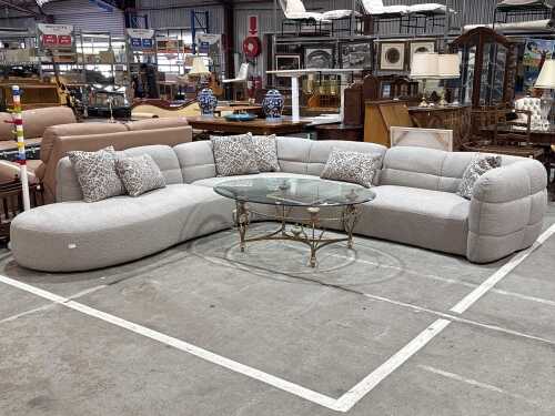 Three-piece grey fabric L-shaped lounge suite - New display stock