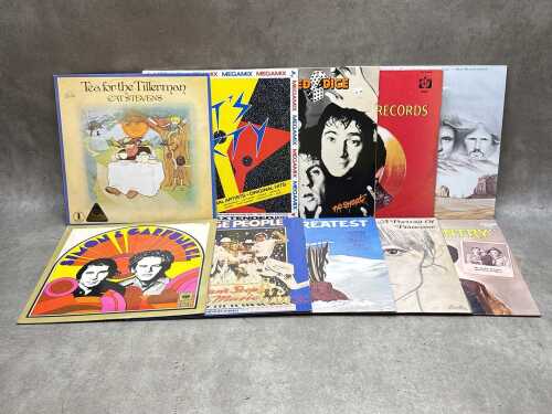 Ten vinyl records, including Cat Stevens, Simon and Garfunkel