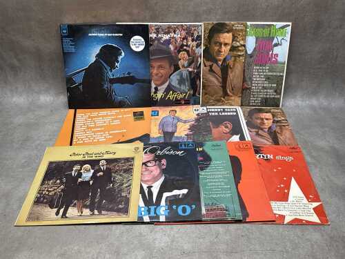 Fourteen vinyl records, including Johnny Cash, Frank Sinatra