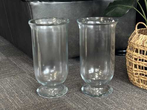 Pair of hurricane clear glass lamps