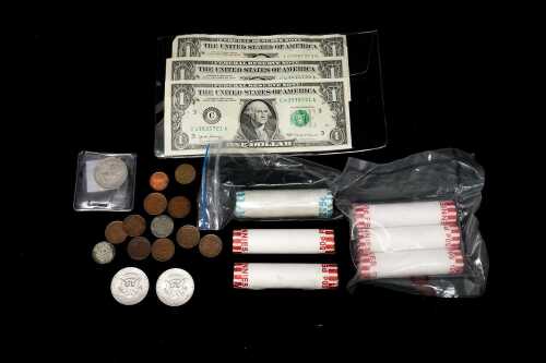 A group of USA coins and banknotes