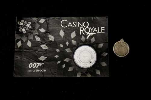 Casino Royale silver proof coin, 1oz, plus a 1956 florin in a silver pendant frame
