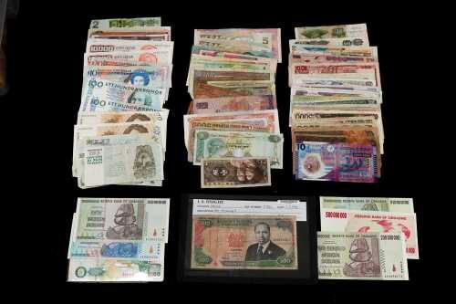 A group of approximately 80 international bank notes