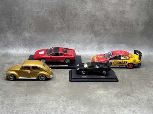 Four model cars, including Classic Carlectibles Shell Helix