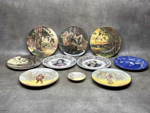 Royal Doulton porcelain cabinet plates including Charles Dickens, Robert Burns, Australian scenes, etc.