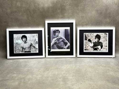 Three Bruce Lee framed prints