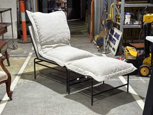 Grey upholstered chaise lounge