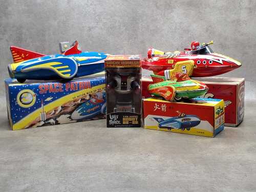 Four vintage tin space toys, in original boxes