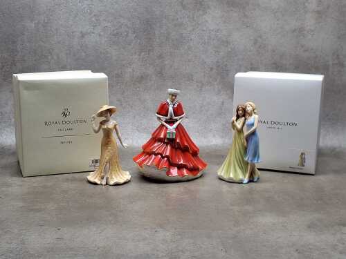 Three Royal Doulton porcelain ladies, in boxes