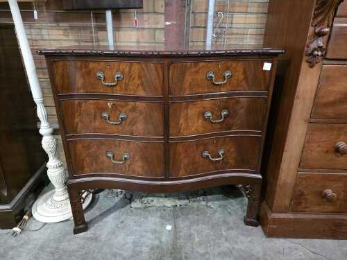 Serpentine front six-drawer chest