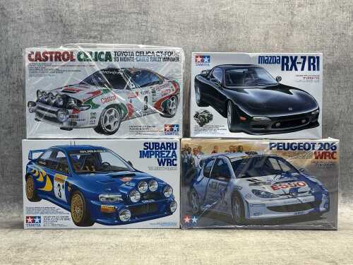 Four Tamiya model cars