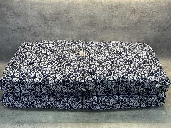 Two Mojo floor cushions
