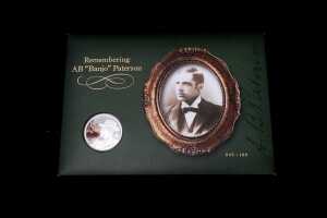2014 Remembering AB "Banjo" Patterson $1 silver proof coin, 1 troy ounce, and four stamps