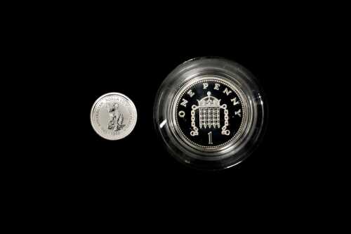 Two coins in 0.925 silver and Platinum
