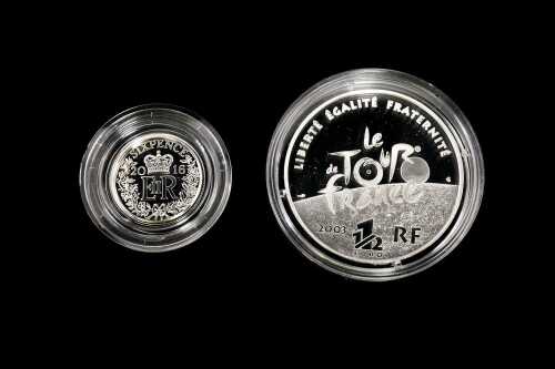 Two silver coins, total 25.55 grams