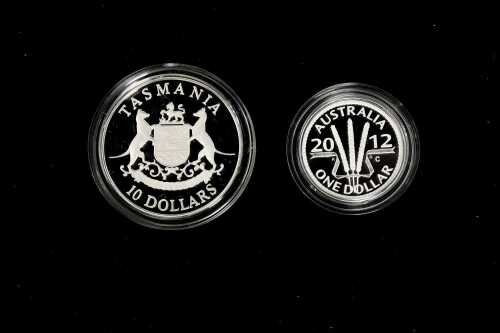 Two coins, One 0.925 silver and one 0.999 silver, total 31.66 grams