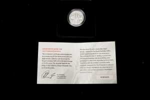 Two coins, One 0.925 silver and one 0.999 silver, total 31.66 grams - 4