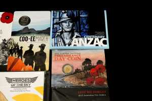 Group of assorted remembrance collectable coins and PNCs, including coloured $2 poppy coin - 3