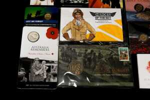 Group of assorted remembrance collectable coins and PNCs, including coloured $2 poppy coin - 4