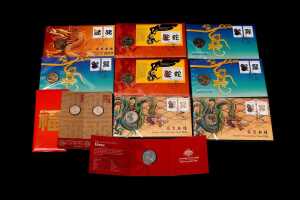 Group of assorted Lunar New Year collectable coins and PNCs