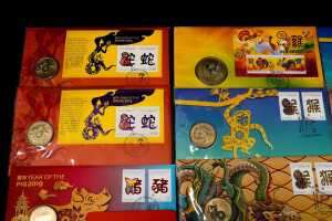 Group of assorted Lunar New Year collectable coins and PNCs - 2