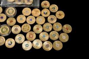 A group of assorted Australian coloured $2 coins - 3
