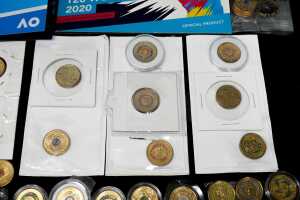 A group of Australian $2 coins, mostly coloured - 2