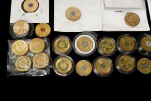 A group of Australian $2 coins, mostly coloured - 4