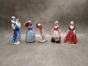 Four Royal Doulton porcelain figures, including Miss Demure