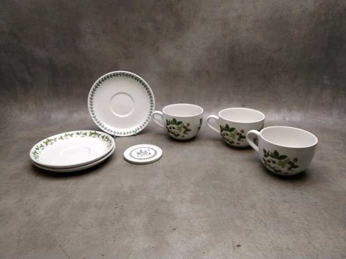 Three Portmeirion 'Summer Strawberries' porcelain breakfast cup and saucers