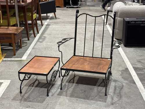 Wrought iron and timber lounge chair and a side table