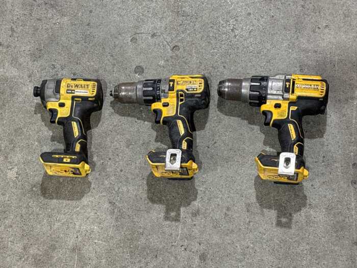 Three DeWalt cordless drills/drivers