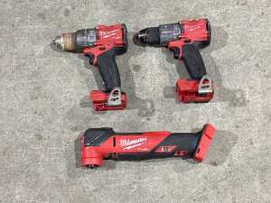 Three Milwaukee M18 FUEL cordless power tools