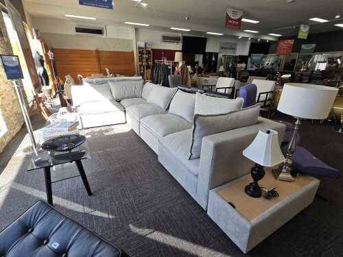 Contemporary modular lounge with two matching storage ottomans