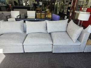 Contemporary modular lounge with two matching storage ottomans - 2