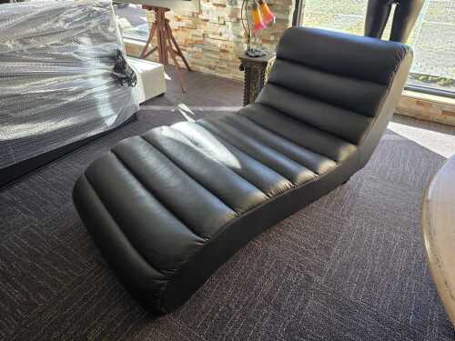 Black leather chaise lounge