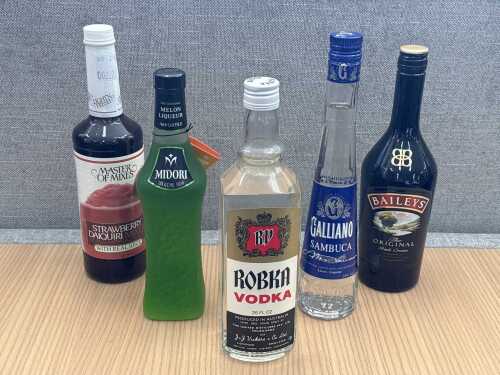 Mixed spirits, liqueurs and cocktail mixer, five bottles