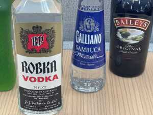 Mixed spirits, liqueurs and cocktail mixer, five bottles - 3