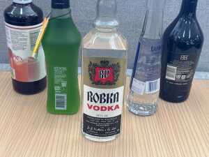 Mixed spirits, liqueurs and cocktail mixer, five bottles - 4