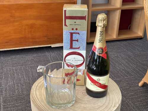 G.H. Mumm Cordon Rouge Brut Champagne with ice bucket