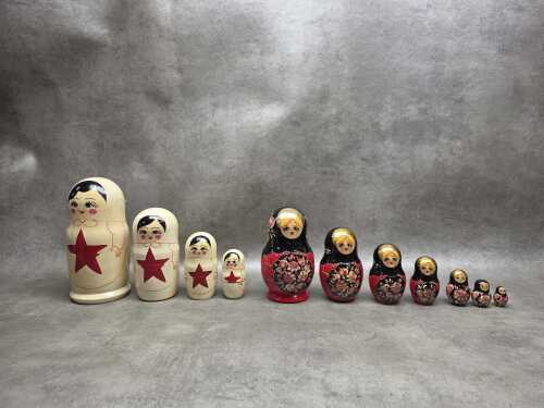 Two hand-painted timber Bubushka nesting dolls
