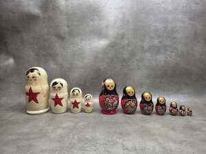 Two hand-painted timber Bubushka nesting dolls