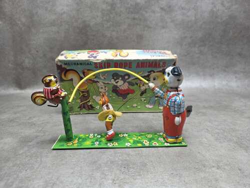 Vintage Japanese tin toy Mechanical Skip Rope Animals