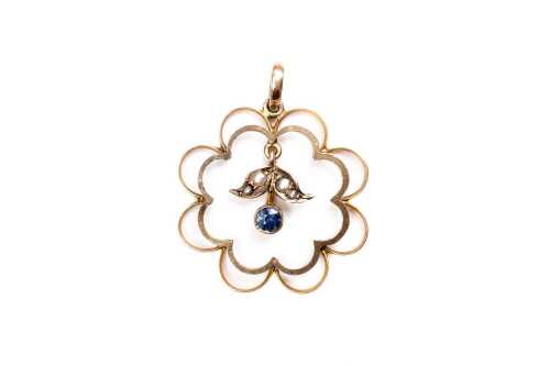An antique sapphire and pearl pendant in 9 carat yellow gold